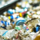 image of plastics and cans on a conveyor belt for recxycling